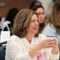 Woman sitting at a table